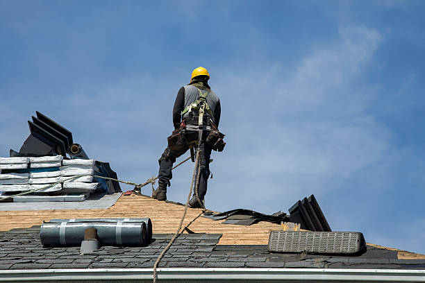 Professional Roof Replacement technician working in Ballouville, CT